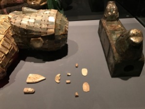 Jade pieces inserted into body to seal openings